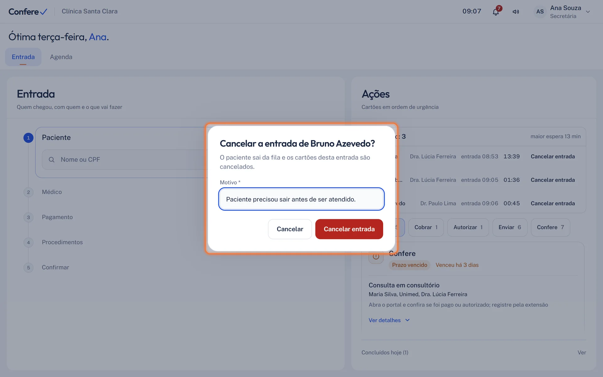 Janela Cancelar a entrada com o nome da paciente, o campo Motivo preenchido e os botões Cancelar e Cancelar entrada